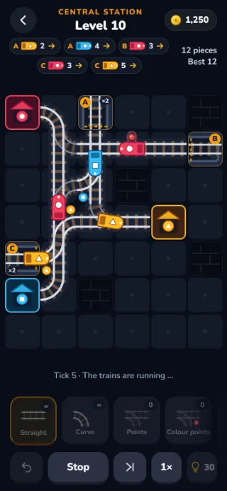 GLEIS board, level 10 of the Central station world: five trains run at once over points, a crossing and colour points, one waiting at a red signal; above, the timetable.